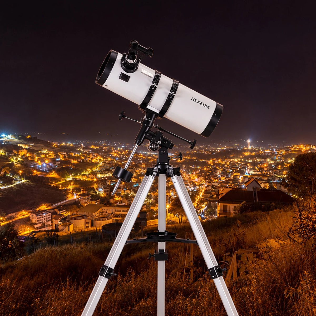 Koolpte Antares 130mm 650mm white reflector telescope with equatorial mount and tripod in an outdoor setting #color_white