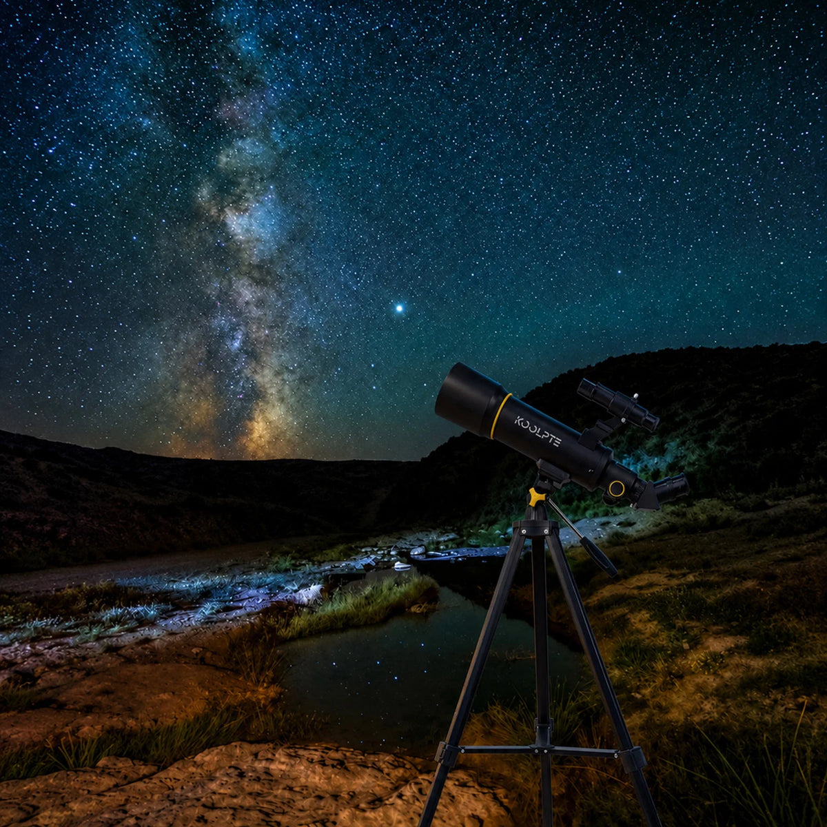 Koolpte Vega Air 70mm 400mm black beginner refractor telescope set up outdoors with tripod