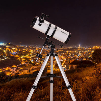 Koolpte Antares 130mm 650mm white reflector telescope with equatorial mount and tripod in an outdoor setting 