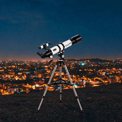 Koolpte Vega Precision 90mm aperture 800mm focal length white telescope in an outdoor stargazing setting 